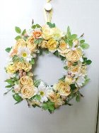 丸い黄色バラのリース