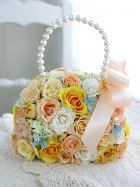 黄色いお花とブルスターのバッグブーケ